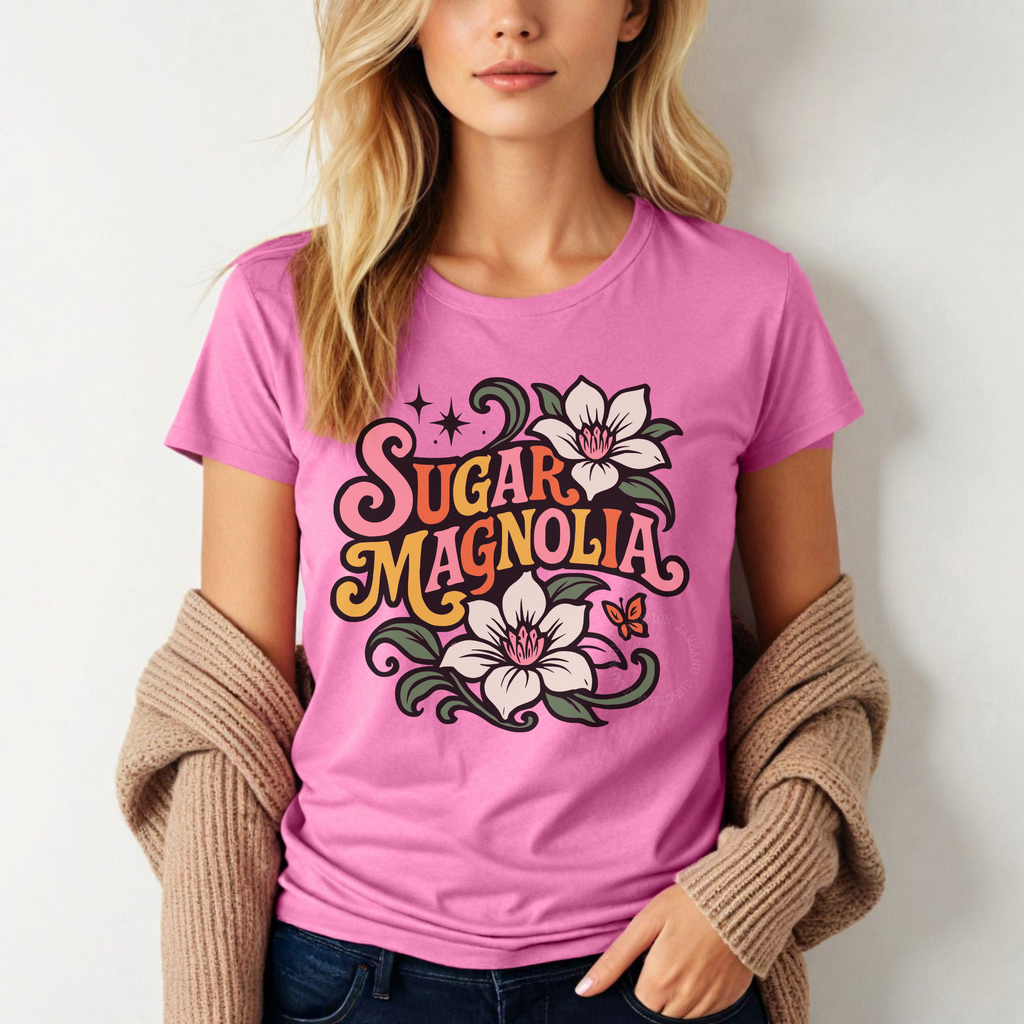 Sugar Magnolia design printed on a Gildan women’s softstyle t-shirt for Deadhead mamas and dreamers.